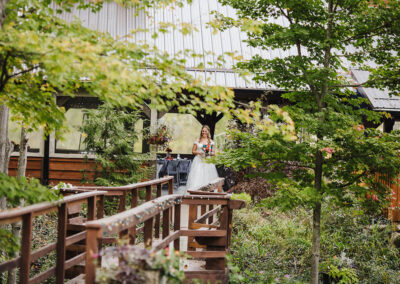 bride walking across bridge